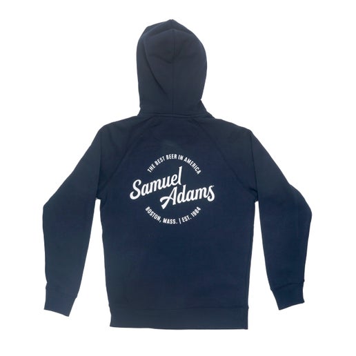 This Olsen hoodie is a midnight navy blue with a design on the back that reads "The Best Beer in America" "Samuel Adams" "Boston, Mass | Est. 1984" in white in the center of the back of the sweatshirt.