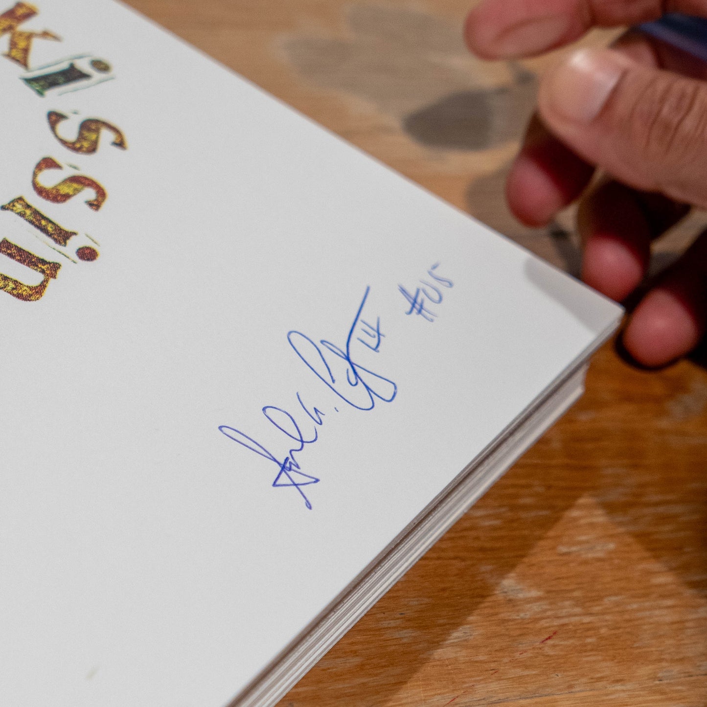 Close up of signature on Festina Peche print