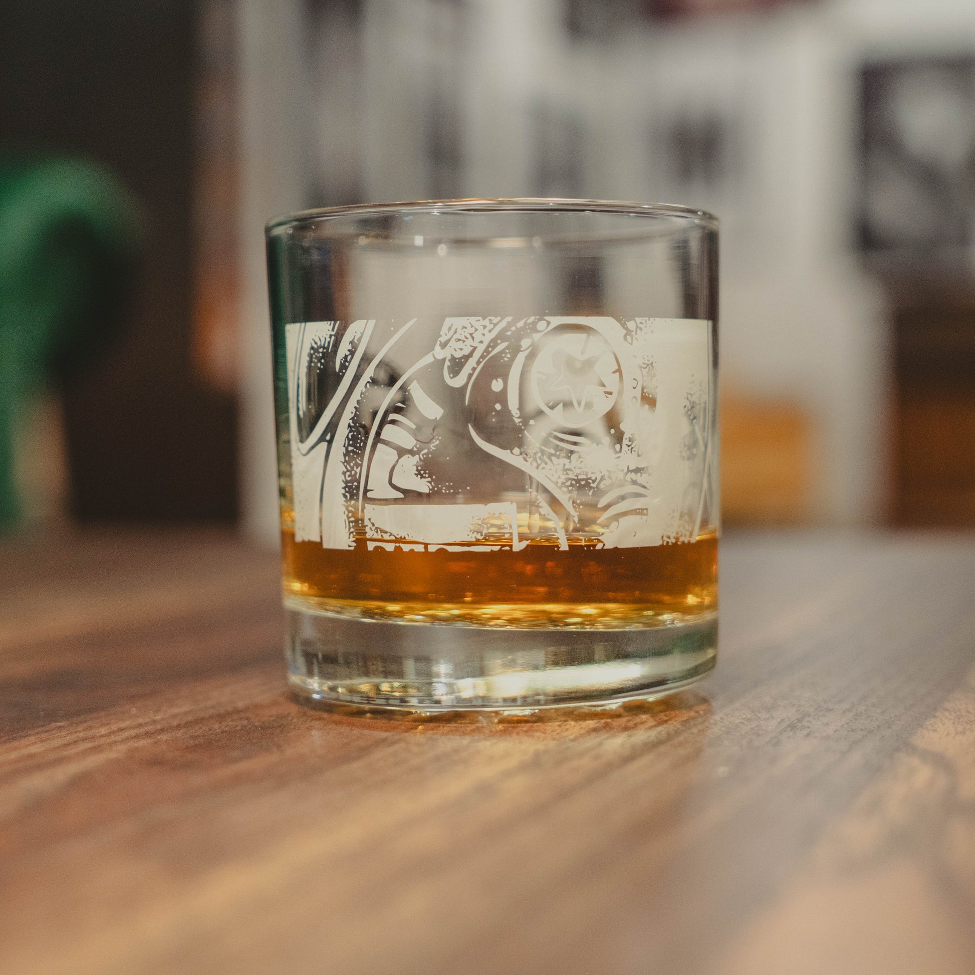 The Dogfish Head x Rolling Stone Whiskey Glass by Grandstand Glassware & Apparel features an etched white design and celebrates 250 years of American music—a unique limited-edition piece perfect for any whiskey lover.