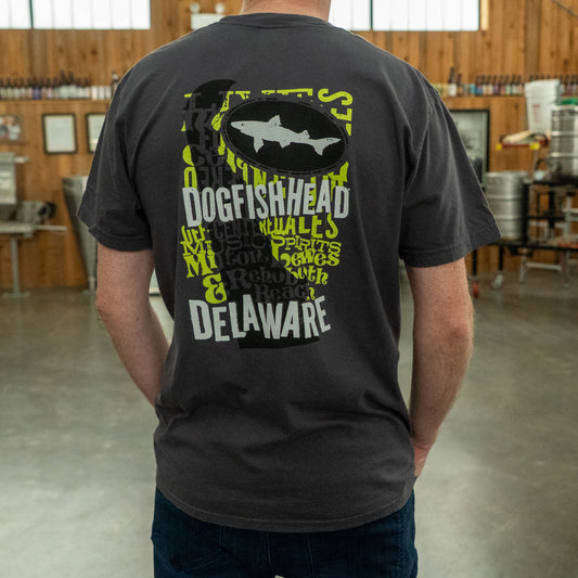 Back view of the graphite Dogfish Head Delaware T‑shirt featuring a large shark graphic and stylized “Dogfish Head Delaware” text.
