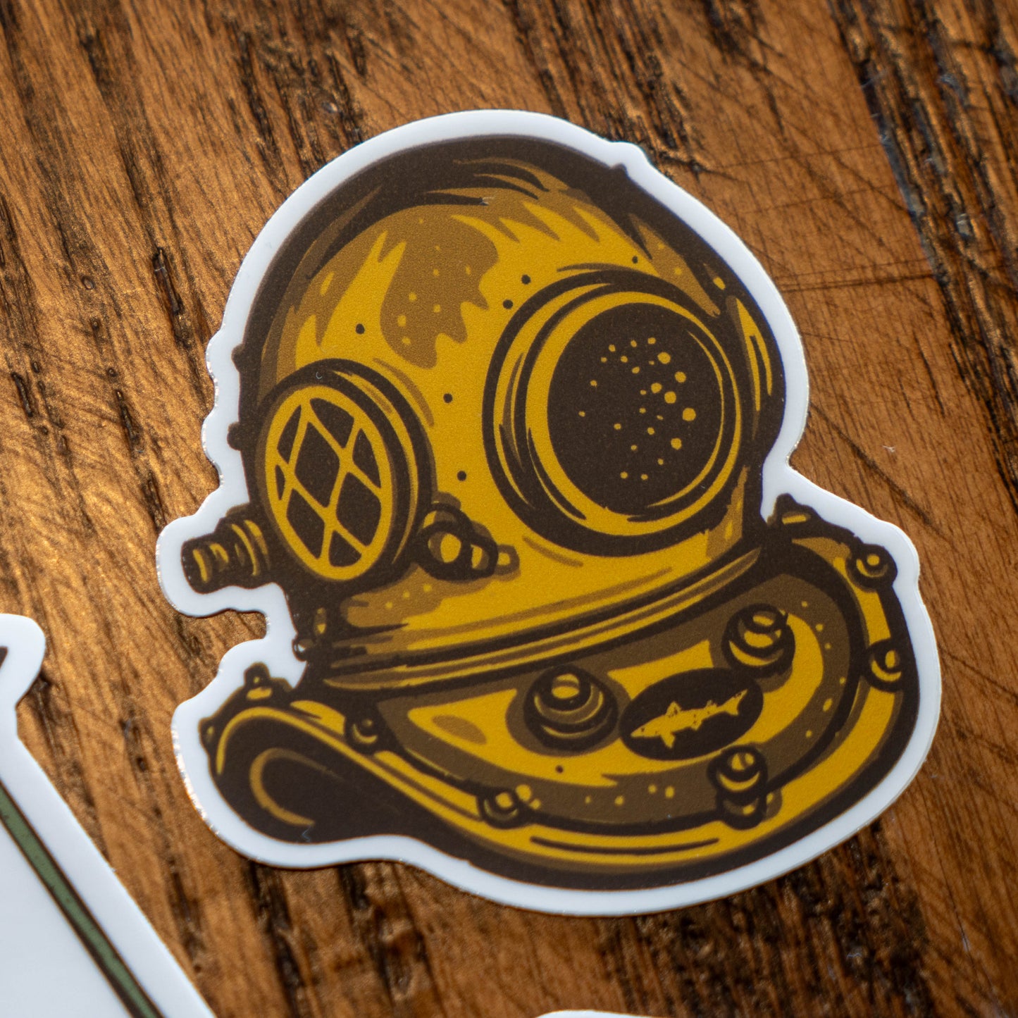 Yellow-gold scuba diving mask sticker.