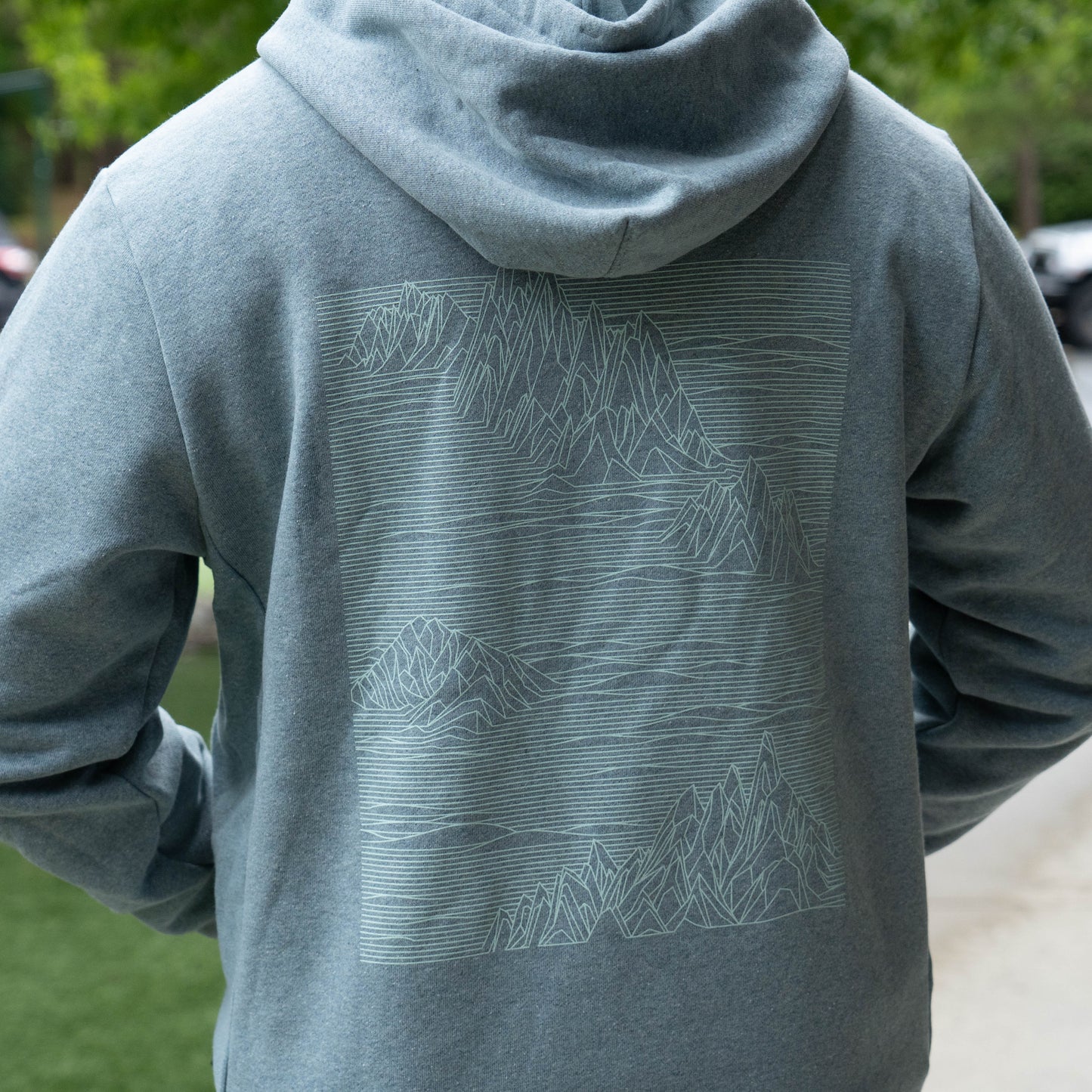 Patagonia Grey Strataspire Uprisal Hoody with minimalist mountain line-art graphic, sustainable recycled fleece hoodie for outdoor and casual wear