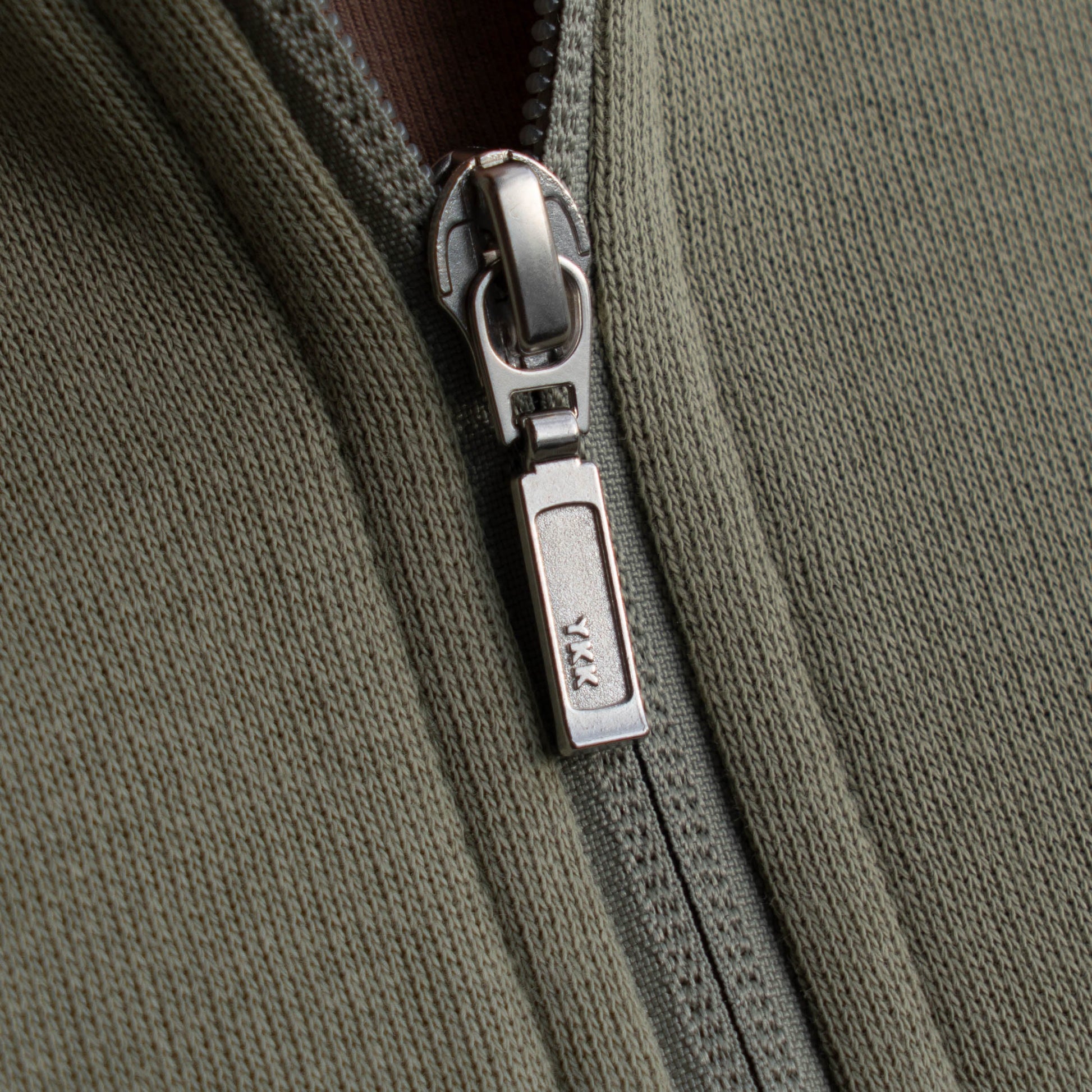Close up of zipper on mineral quarter zip pullover sweatshirt