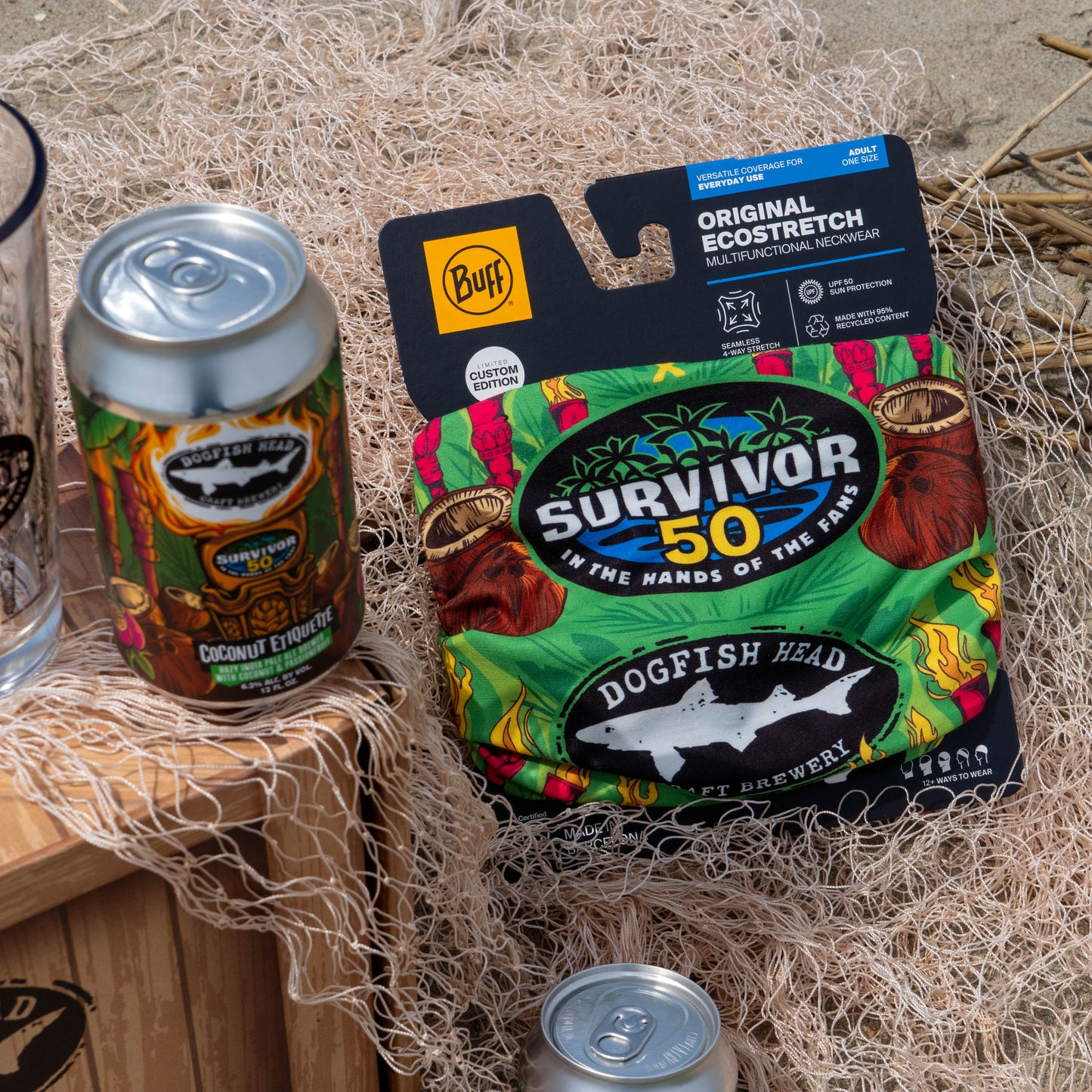 Survivor 50 x Dogfish Head green buff and a Dogfish Head Survivor 50 Coconut Etiquette hazy india pale ale can 