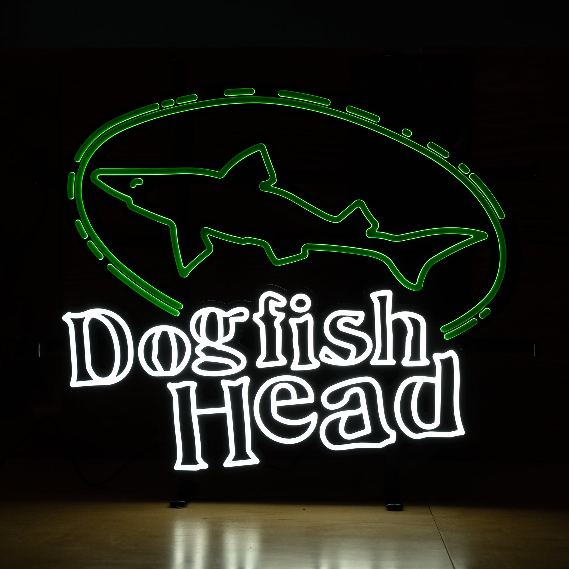 Dogfish Head LED neon light featuring green shark logo and white Dogfish Head lettering, illuminated bar wall sign