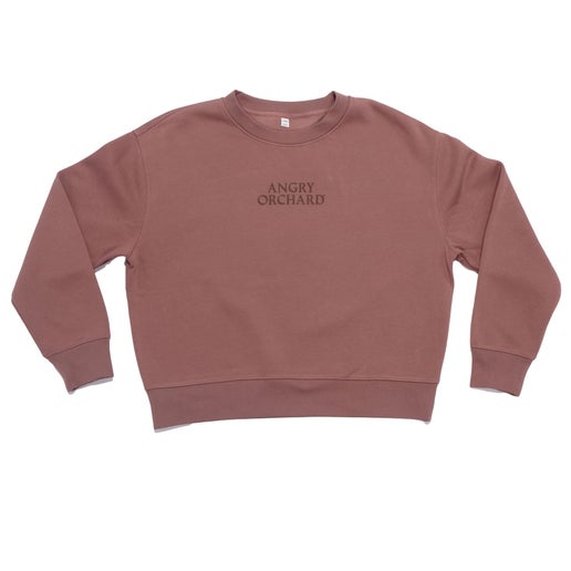 Centered on the front of crewneck is writing "Angry Orchard".