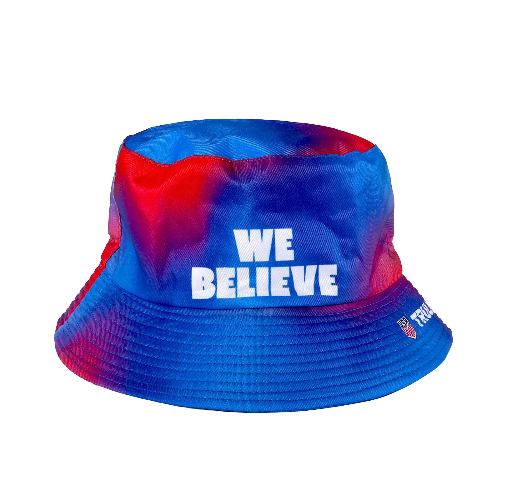 Inverse side of red and blue tie dye bucket hat with "WE BELIEVE" in white text and a USA logo and Truly logo in white text on the brim