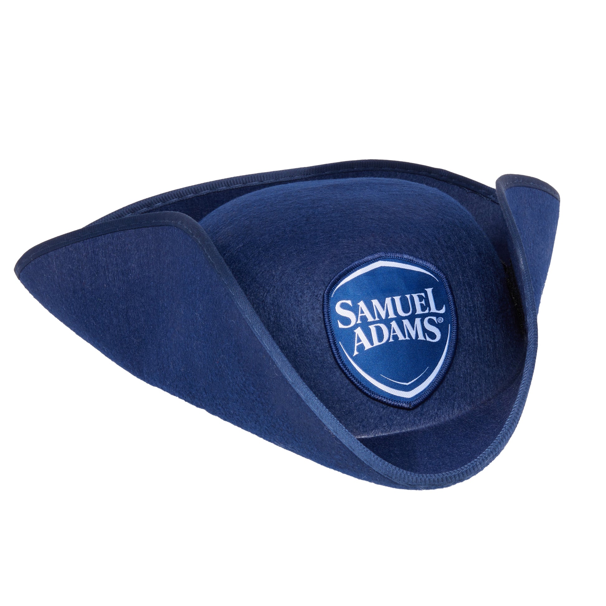 Side view of Samuel Adams tri‑corner uniform hat featuring structured navy fabric and a blue Samuel Adams logo shield patch