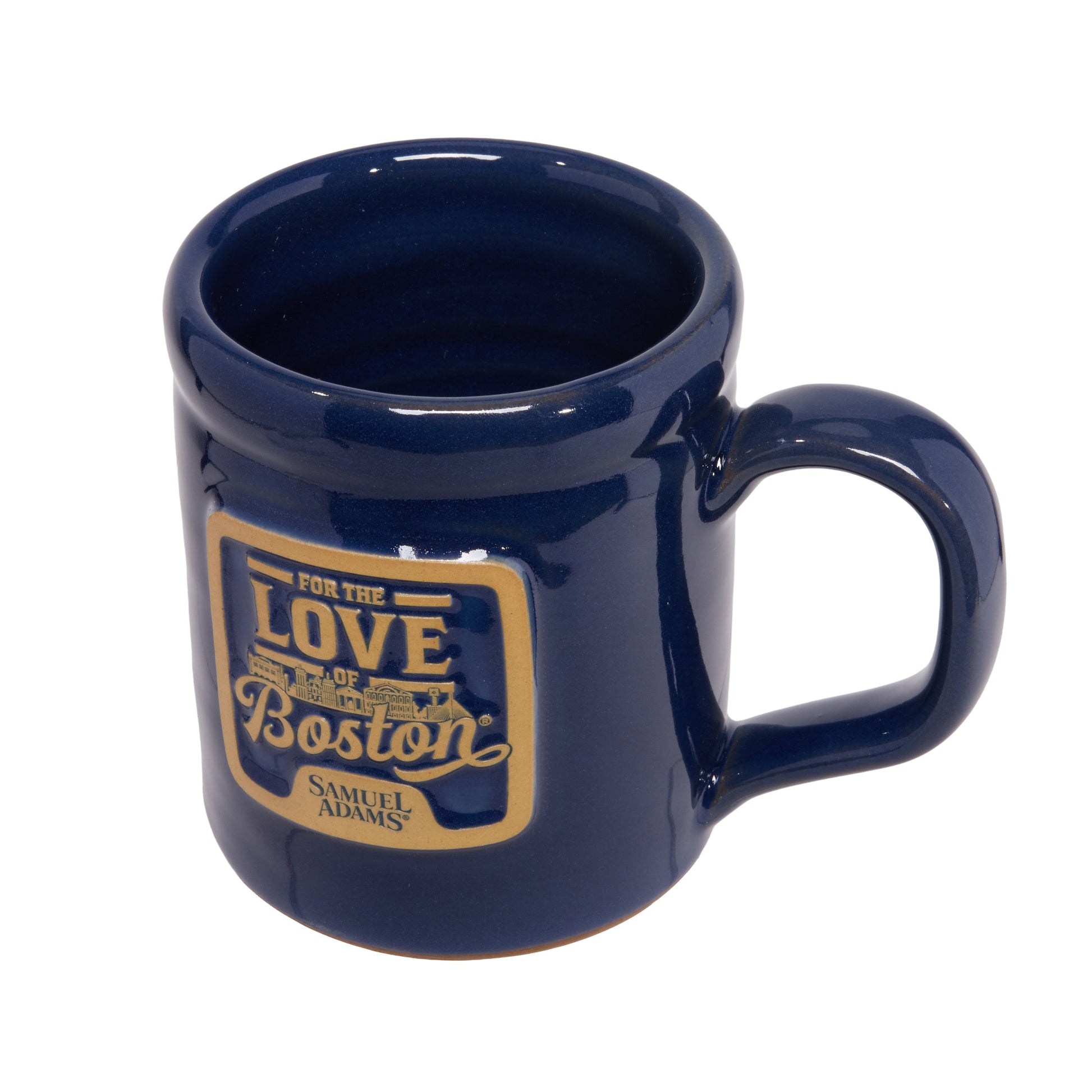 Angled view of heritage blue “For the Love of Boston” ceramic mug with a Boston skyline design and a Samuel Adams logo