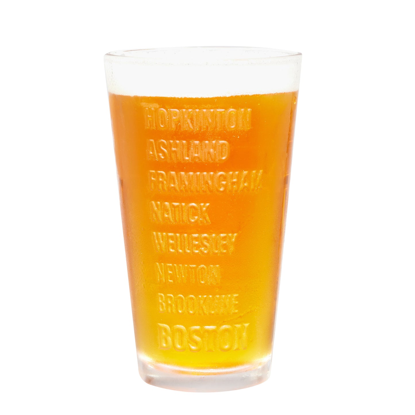 Embossed marathon shaker pint glass displaying raised names of Boston Marathon host cities including Hopkinton, Ashland, Framingham, Natick, Wellesley, Newton, Brookline, and Boston, filled with golden beer.