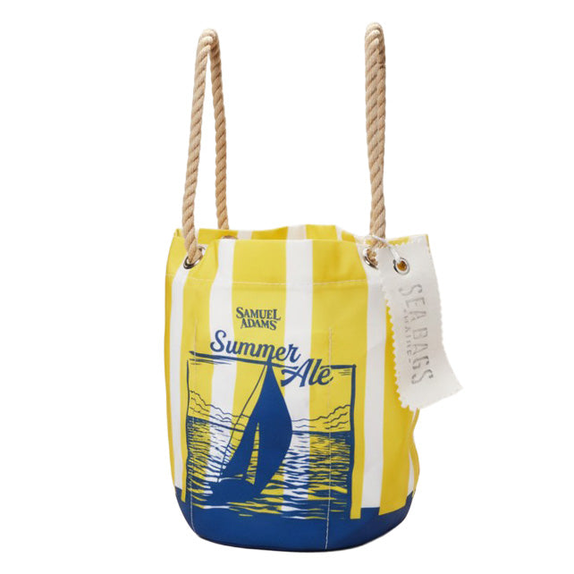 Yellow Summer Ale sailboat beverage bag with vertical rope handles, nautical stripes, and branded hang tag