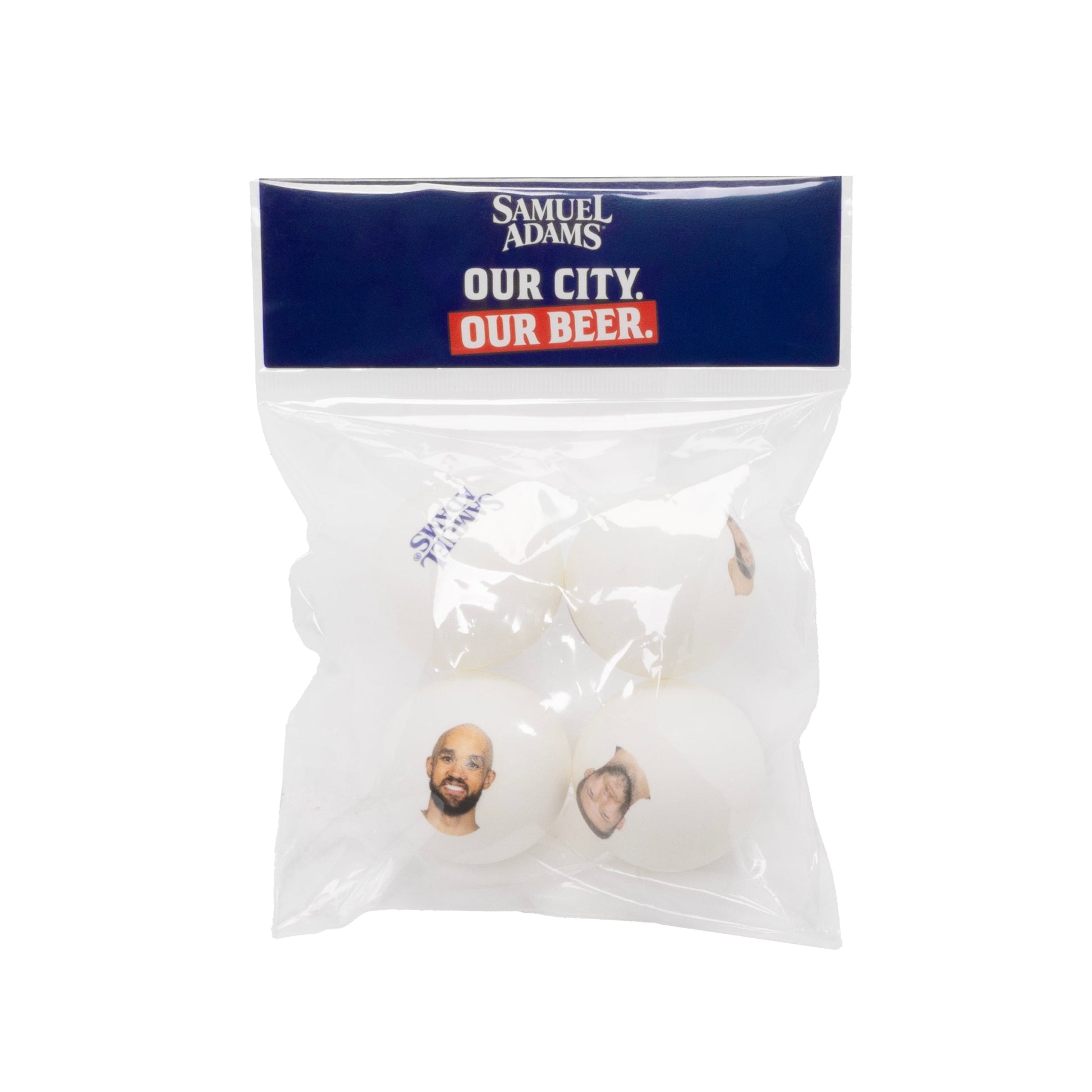 Pack of white ping pong balls with navy header in plastic wrap.