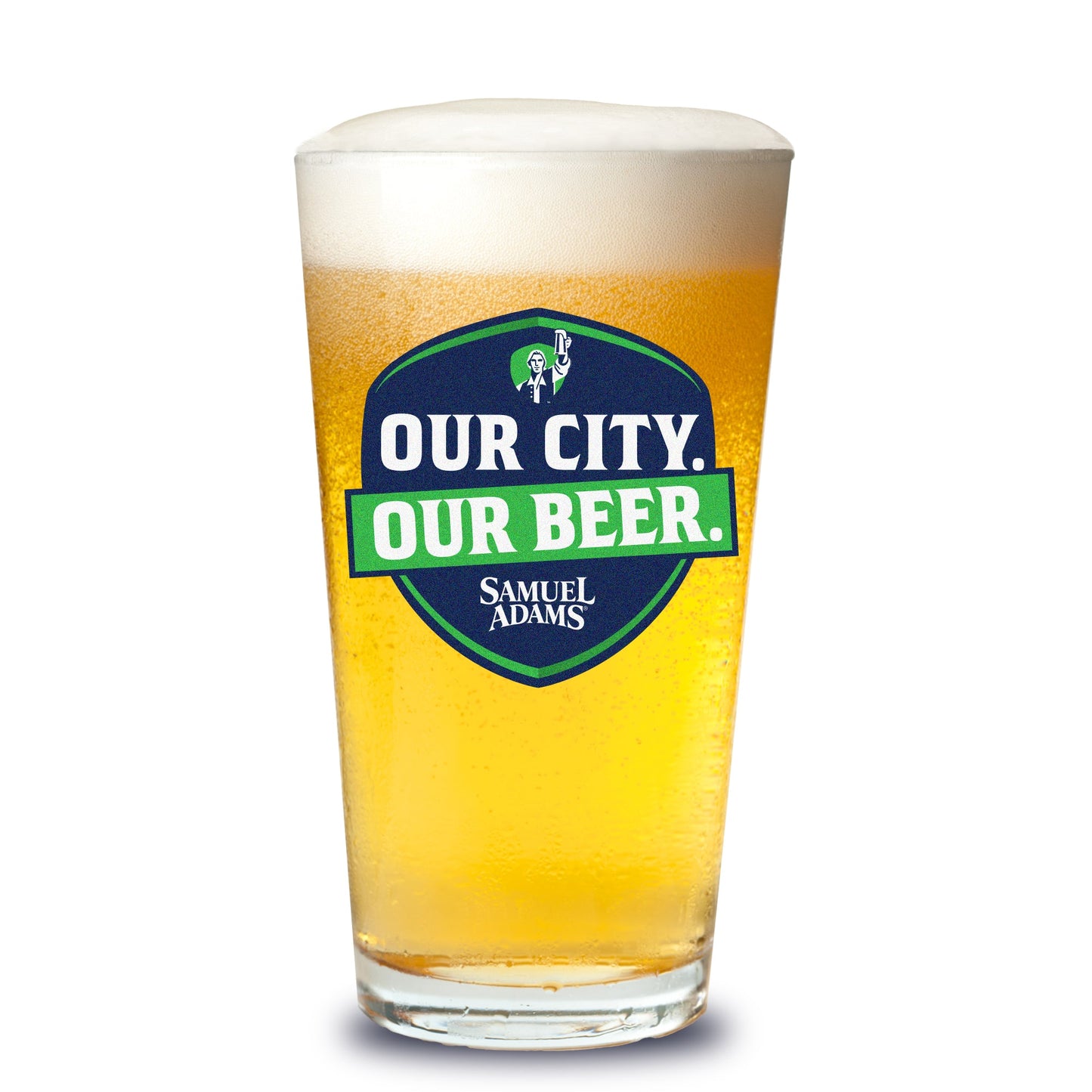 Filled pint glass with a limited-edition Samuel Adams shield logo with "Our City, Our Beer" styled in green and navy font.