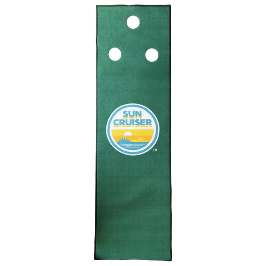 Sun Cruiser putting green practice mat with a long rectangular shape, green turf surface, three white putting holes, and a centered retro Sun Cruiser logo in teal, yellow, and orange.