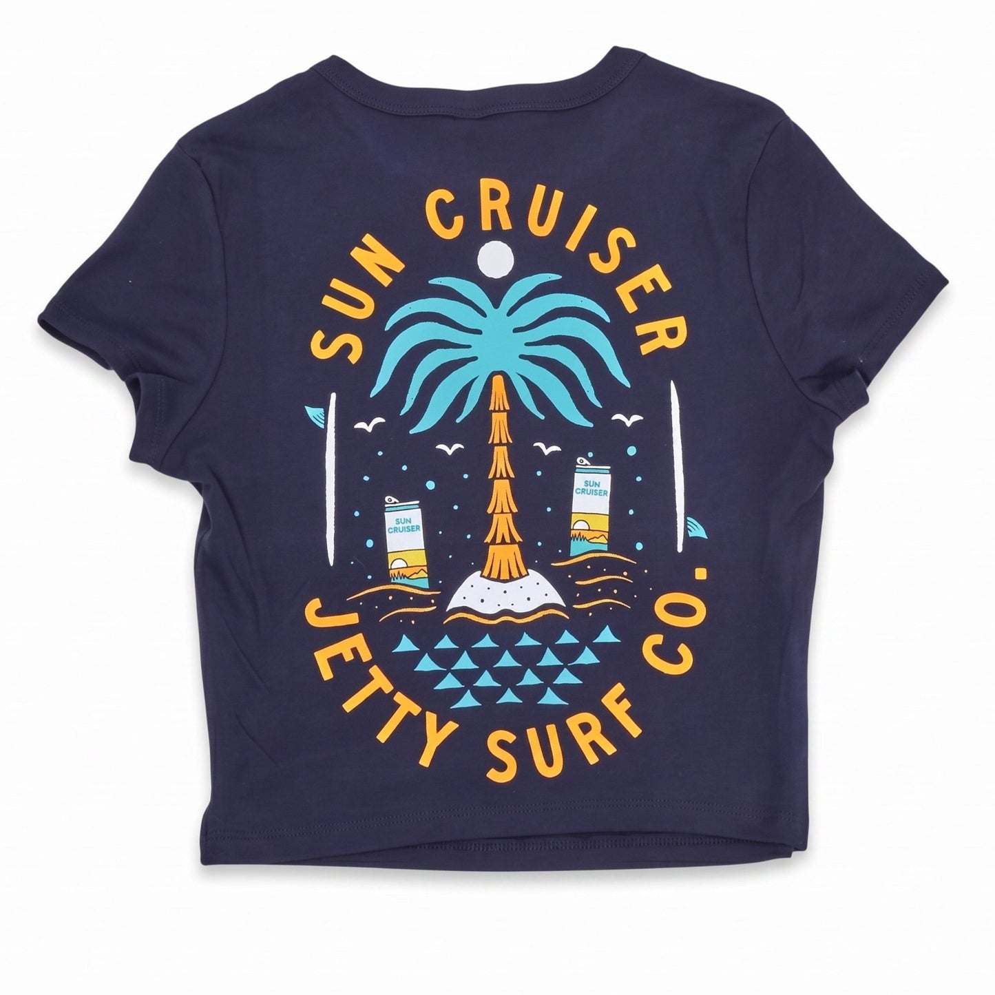 A navy blue short-sleeve t-shirt with a colorful graphic on the back featuring a turquoise palm tree, a yellow lighthouse, and yellow text reading 'SUN CRUISER JETTY SURF CO.' on a white background.