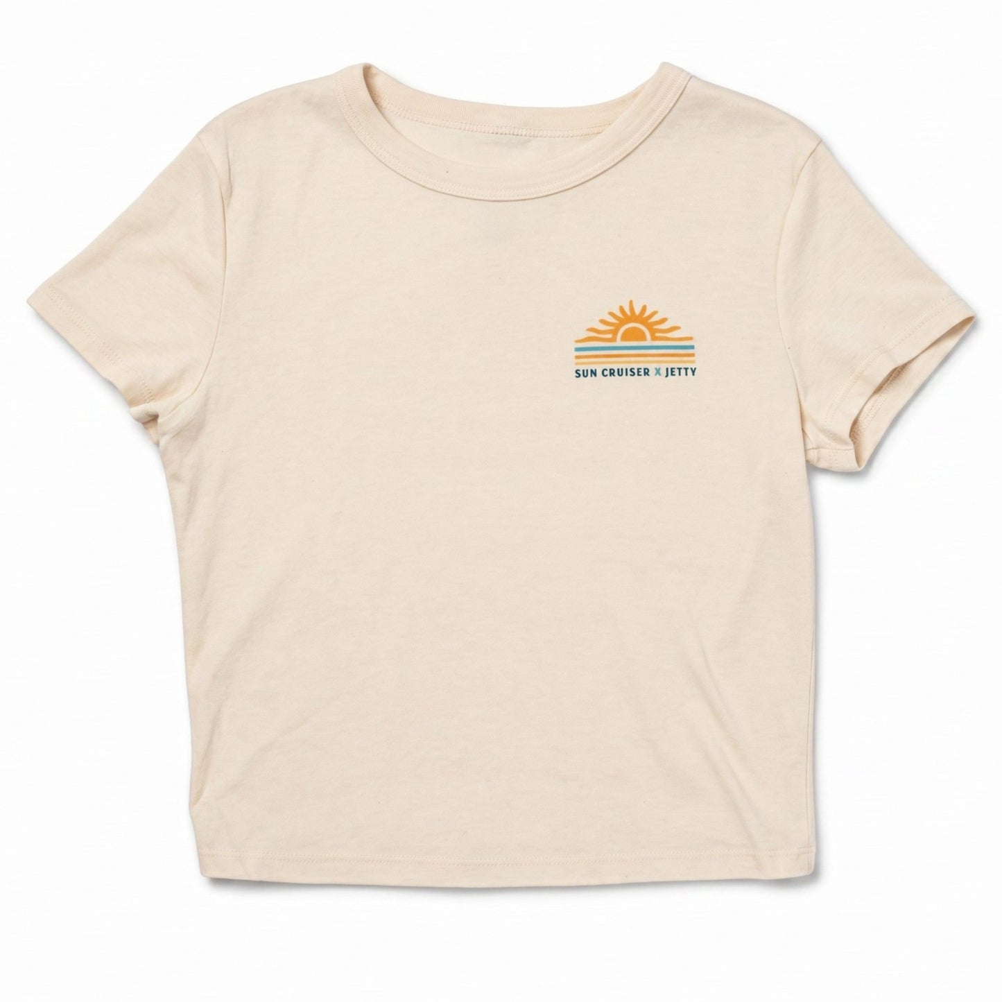 A light beige short-sleeve t-shirt with a small graphic on the left chest featuring a yellow sun, blue and orange stripes, and the text 'SUN CRUISER x JETTY'.