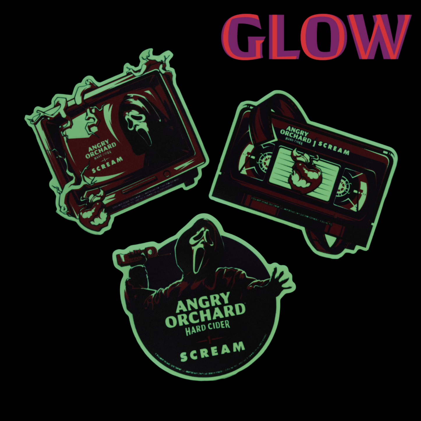 Three stylized Scream-themed stickers on a black background: a framed TV graphic, a cassette tape, and a circular character graphic with the text 'ANGRY ORCHARD HARD CIDER SCREAM.' The word 'GLOW' appears in large pink-to-purple gradient letters at the top right.