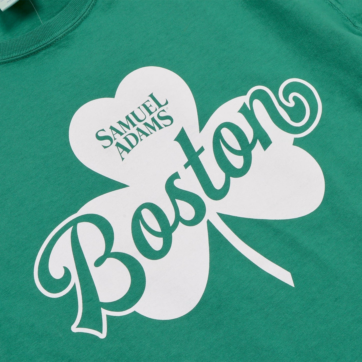 White clover and Samuel Adams Boston on a green background