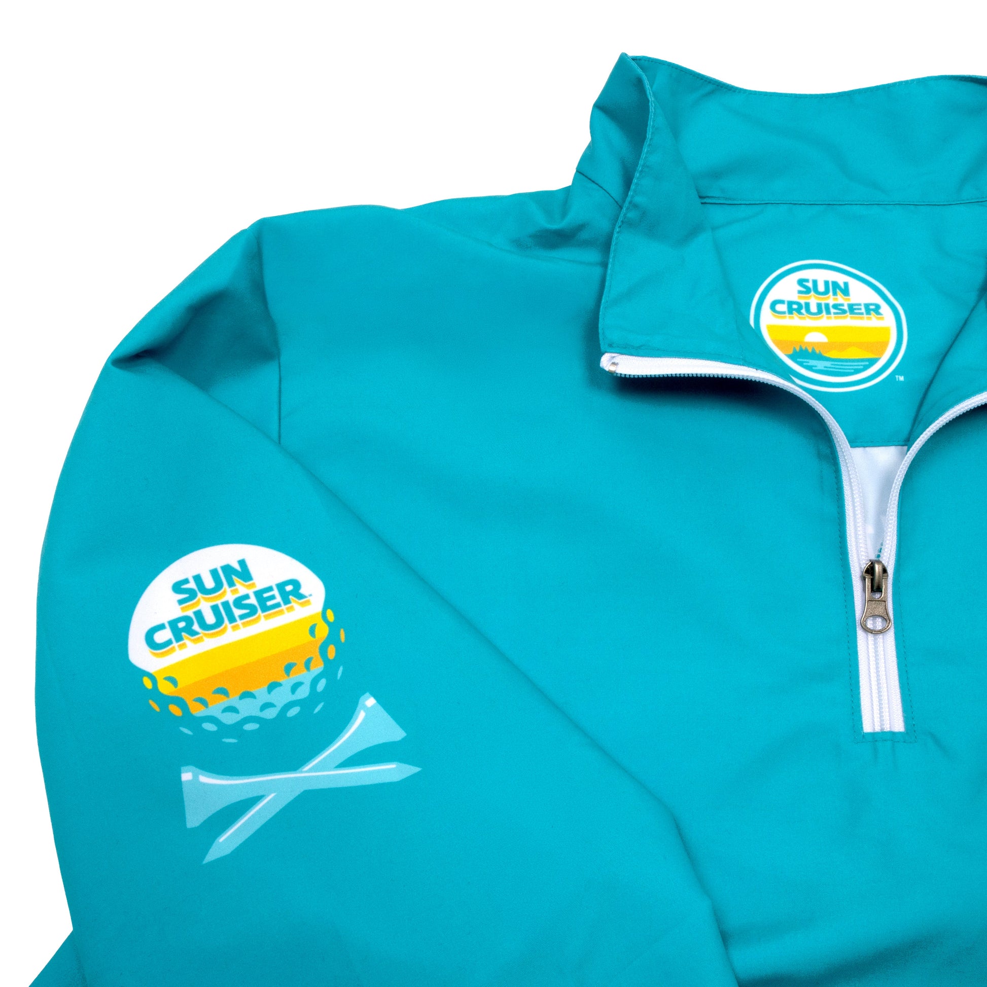 Close up of Sun Cruiser Golf Tee logos on the inside collar and right sleeve of a teal windbreaker