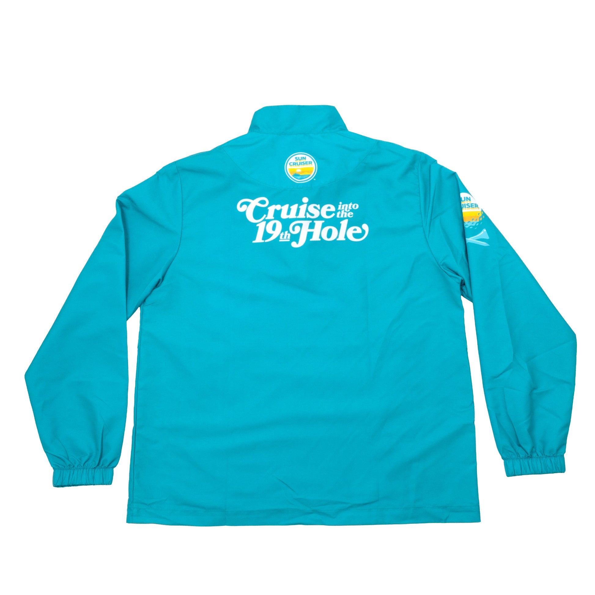 Backside of teal Sun Cruiser teal windbreaker with a Sun Cruiser logo and cursive white text that ready "Cruise into the 19th Hole"