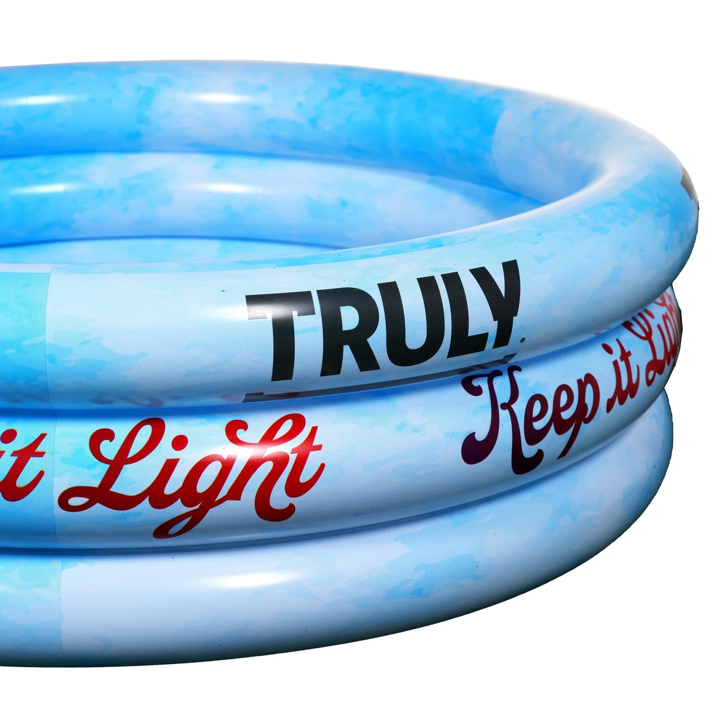 A close-up view of the side of an inflatable beverage pool, showing two light blue rings with a white and blue marbled pattern. The top ring has "TRULY" in black bold letters, and the middle ring has "Keep it Light" in red cursive.