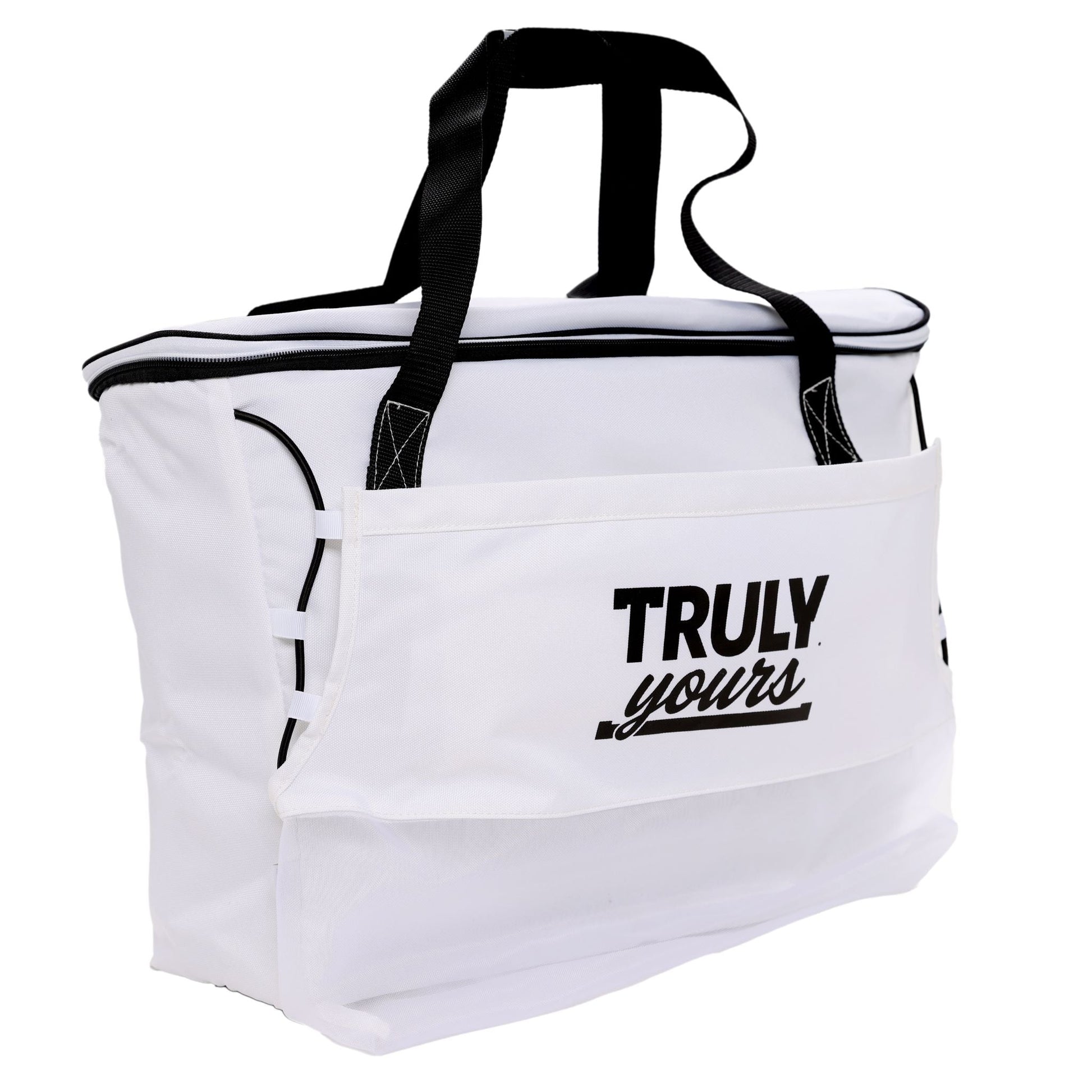 A white tote bag with black handles, a top zipper closure, and additional side pockets. The front of the bag features a large pocket with the phrase 'TRULY yours' printed in black—'TRULY' in bold uppercase letters and 'yours' in a cursive font. The bag appears to be made of durable fabric and is designed for everyday use or casual outings.