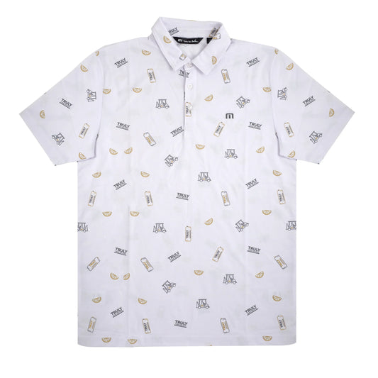 A white short-sleeved polo shirt with a repeating pattern. The pattern consists of small illustrations of Truly Hard Seltzer cans labeled 'TRULY', citrus fruit slices, and a small stylized 'M' logo, scattered across the shirt.