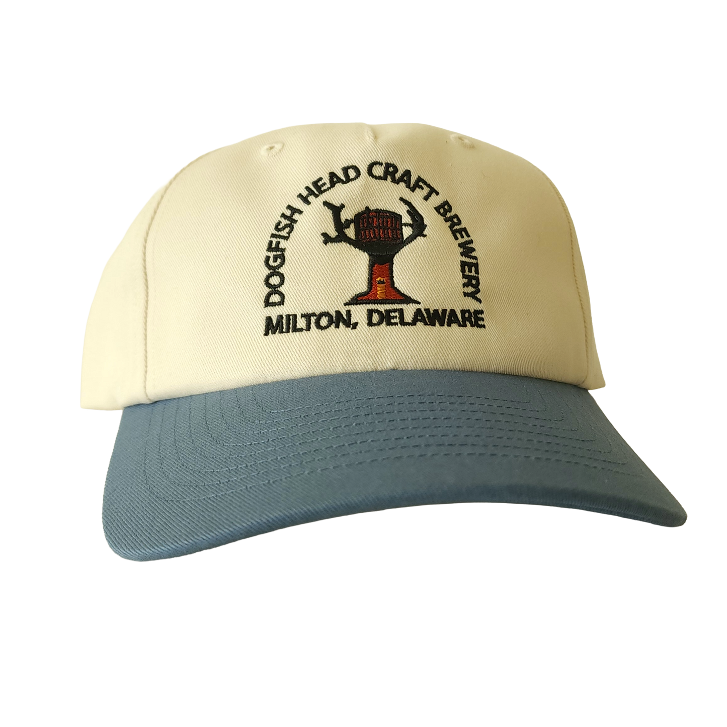 Cream hat with blue brim. Embroidered front with Dogfish Head Craft Brewery Milton, DE text. 