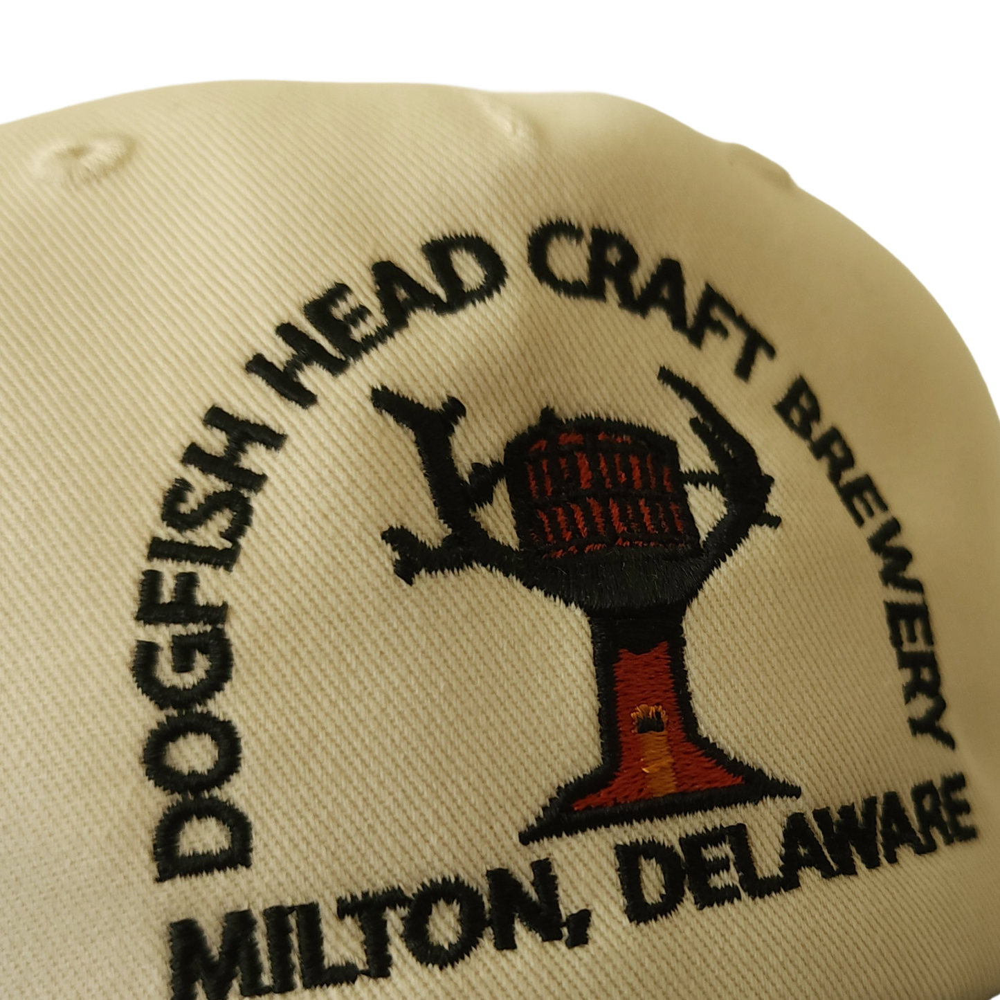 Close up view of embroidery with Dogfish Head Craft Brewery Milton, DE text