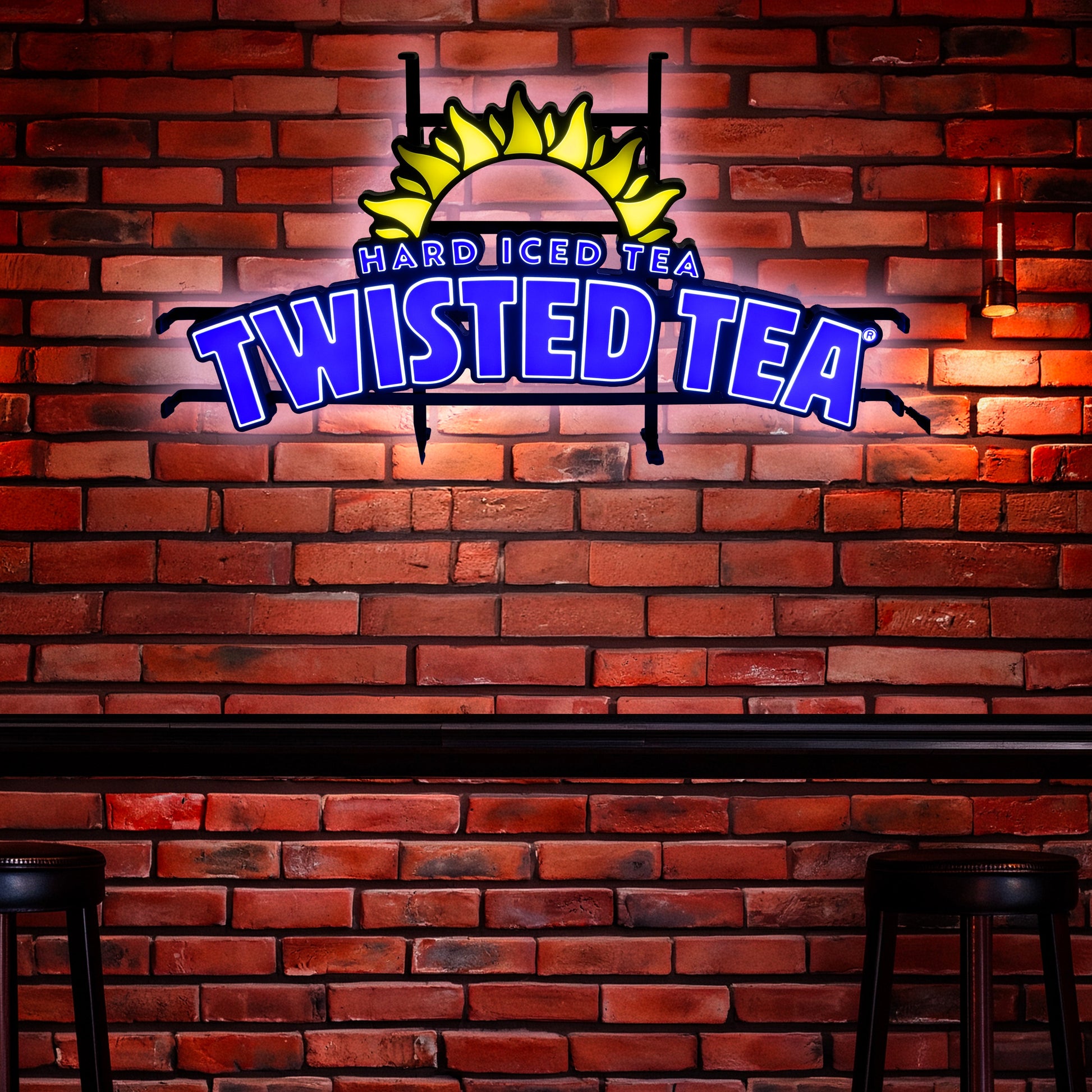 LED light with a hard iced tea twisted tea logo. From top to bottom is a yellow neon LED semi circle sun, followed by "Hard Iced Tea" in all caps small blue LED text, and "TWISTED TEA" in much larger LED text glowing at the bottom. 