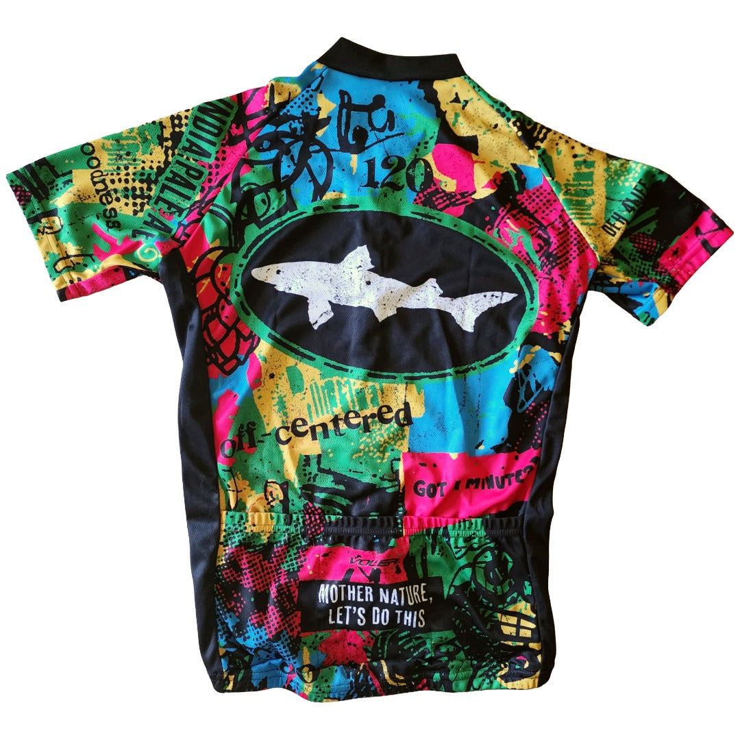 Back view of Dogfish Head multi-colored cycling jersey featuring shark logo graphic, rear pockets, and vibrant all-over print design for biking