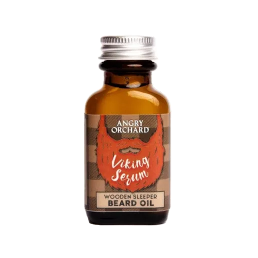 This image shows the front of the beard oil label which has imagery of a red beard with writing "Viking Serum" on it. 