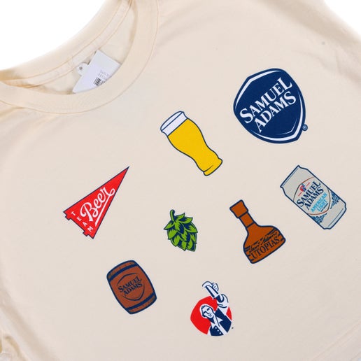 Close-up of the front graphic showing nine assorted clip-art style illustrations, including a beer pennant, pint glass, hop cone, Sam Adams barrel, Utopias bottle, and Boston Lager can.