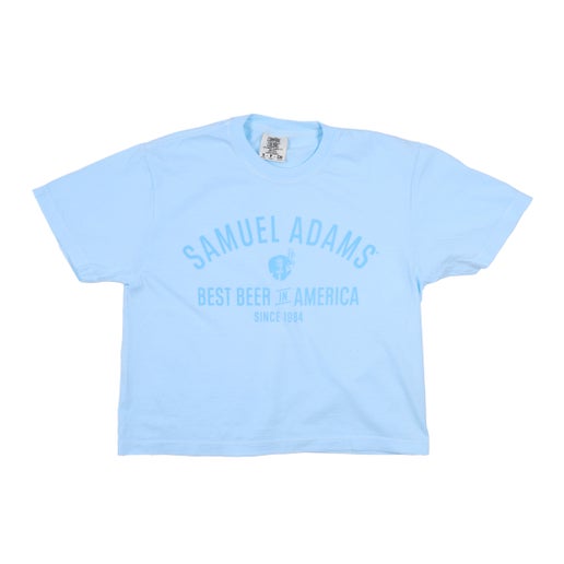 Front of light blue women’s t-shirt with “Samuel Adams Best Beer in America” printed in blue.