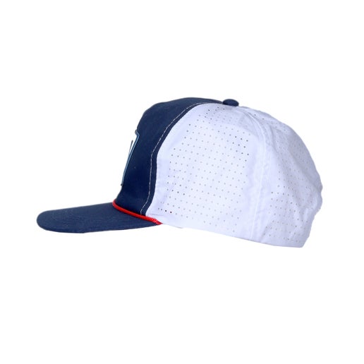 Side view of navy trucker hat with red rope piping and a white Samuel Adams patch on the front.