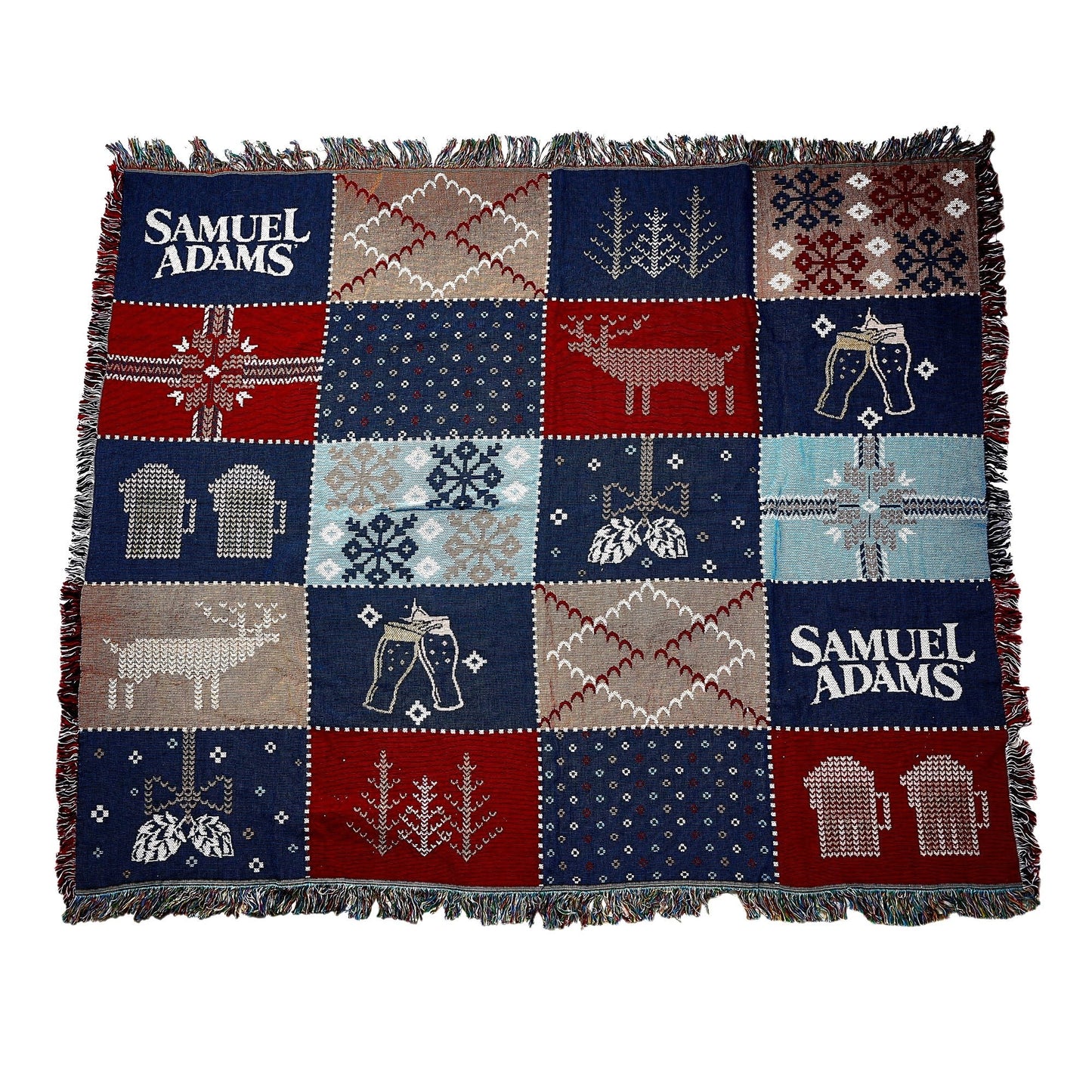 Winter Tapestry Blanket with squared, ugly sweater patterns in tan, red, light blue, and navy