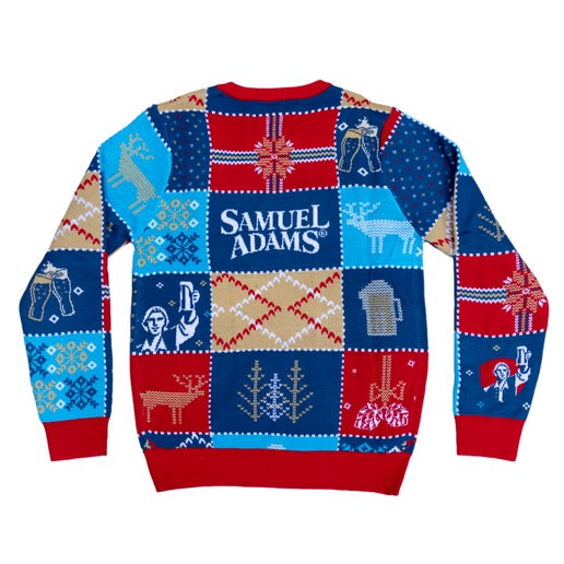 Sweater with a repeating square pattern all over the sweater. Squares vary with a red present, a light blue with a white deer, a dark blue with a white Sam Adams logo, a dark blue with a white Sam Adams hoisting a beer, a dark blue with a beer stein, a light blue with a snowflakes, and a tan square with a plaid pattern.