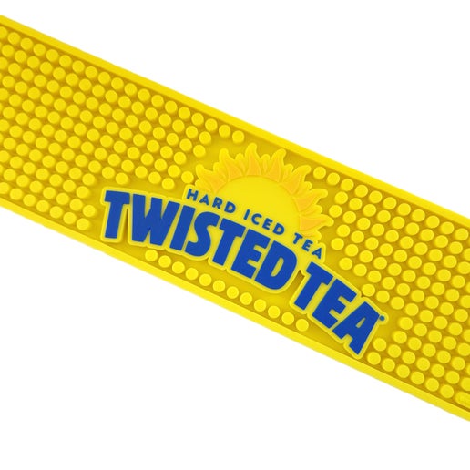 Yellow Twisted Tea rail bar mat featuring raised textured grips across the surface and a bold Twisted Tea logo with sunburst graphic in the center.