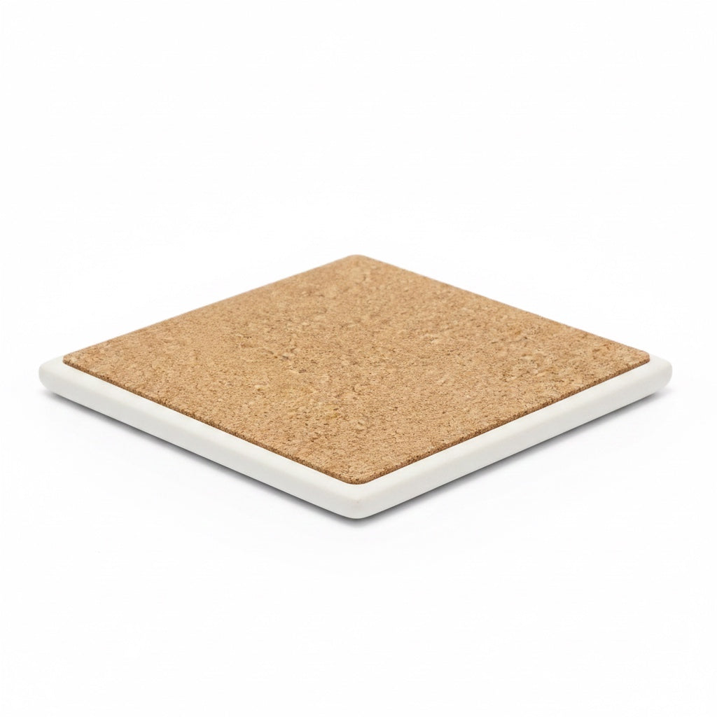 A side view of a coaster, with ceramic edge and cork top. 